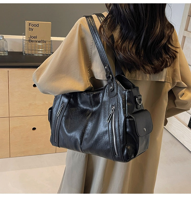 Amira - Bolsa de Mano de Cuero